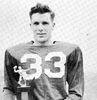 John_Nichols_holding_Sunbeam_Trophy_won_by_the_1962_Varsity_Football_Team.jpg